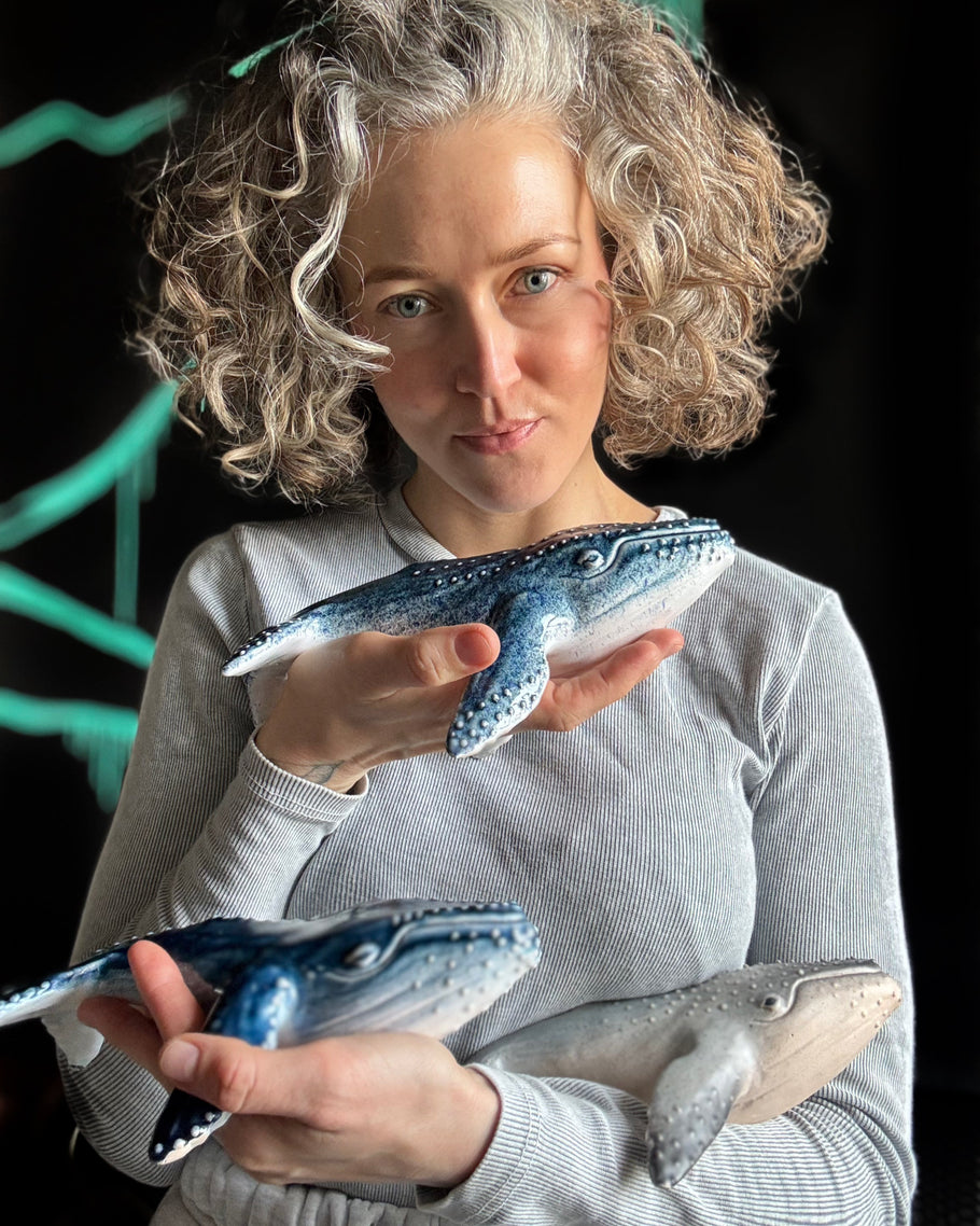 Handmade ceramic figurines collection featuring whale figurines, ocean-inspired ceramic sculptures, and unique handmade art pieces by KUST Ceramics