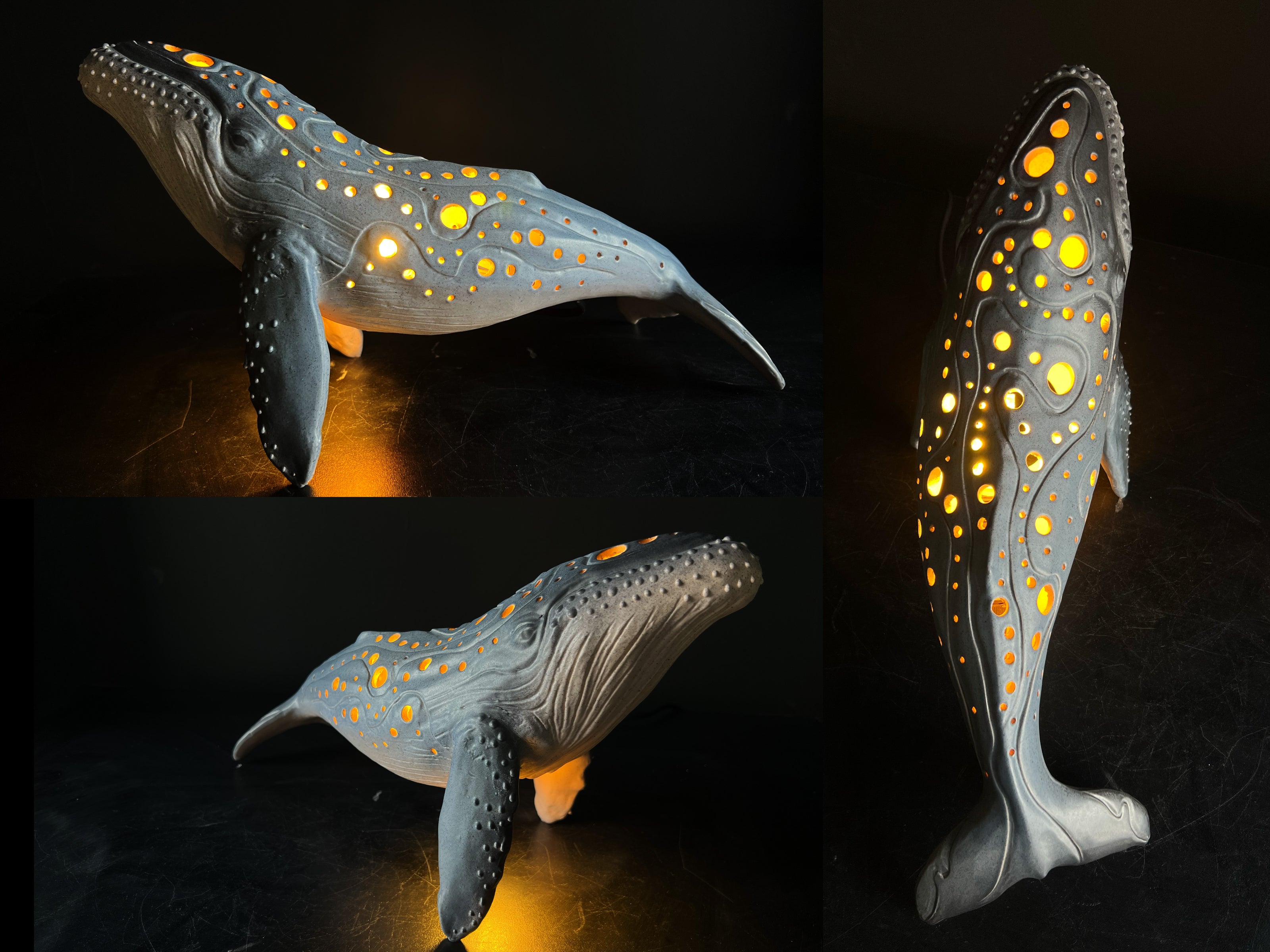 Whale-shaped lamp with glowing interior on a dark background