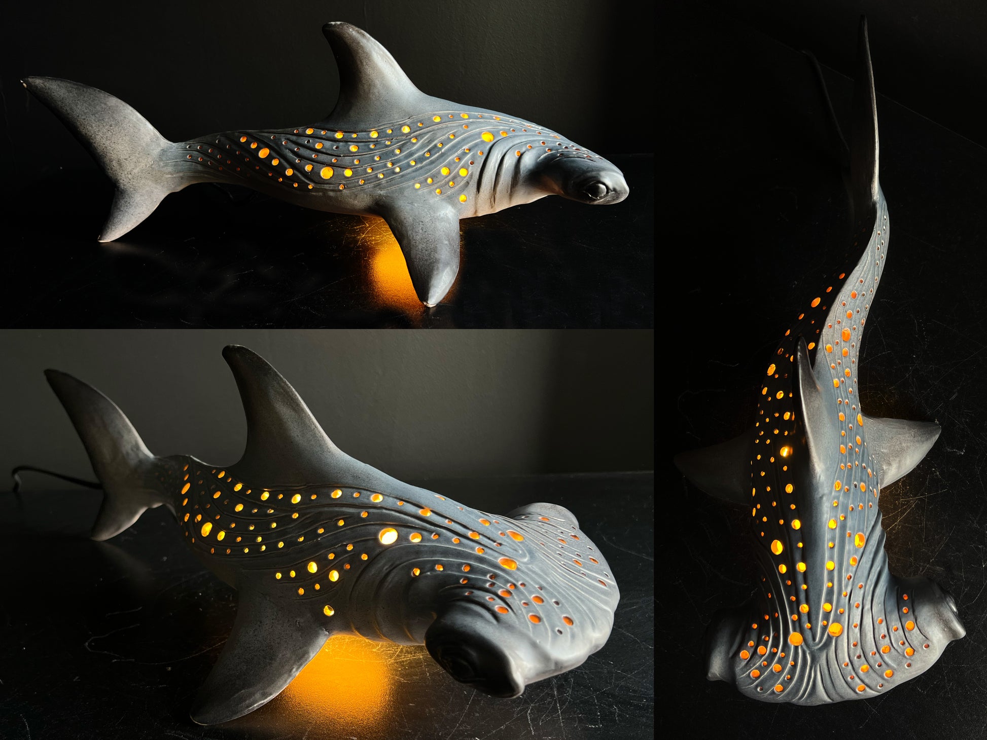 Shark-shaped night light with glowing interior on a dark background