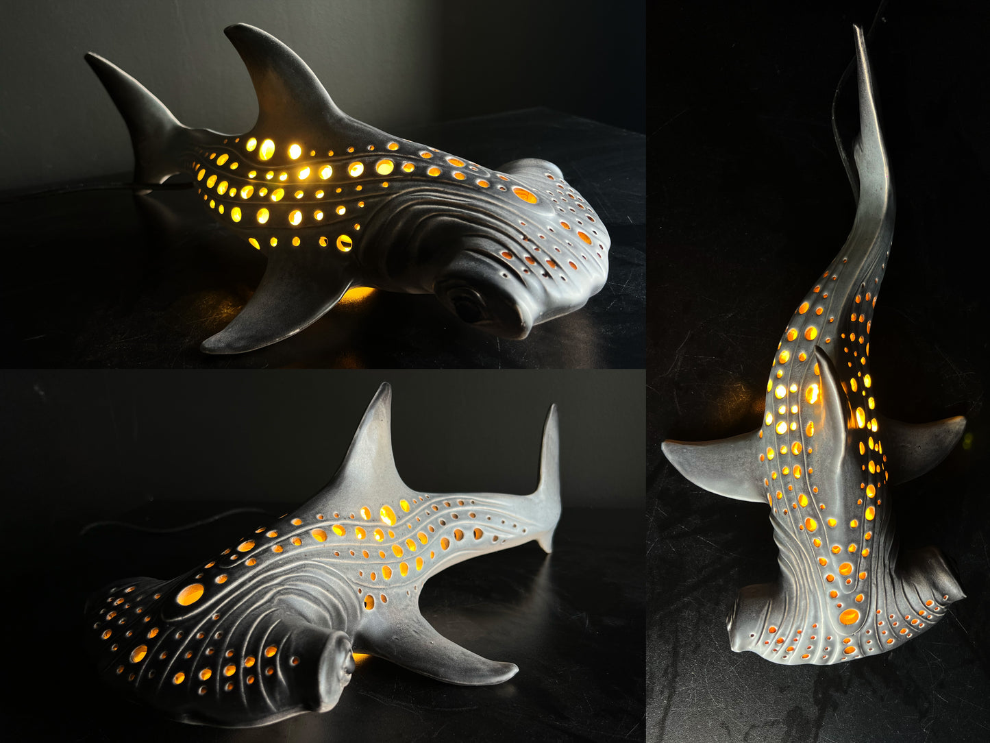 Decorative shark-shaped lamp with glowing interior on a dark background